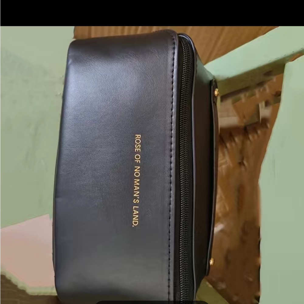 Black, rose of no man’s land make up bag